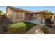 Large backyard with grass, gazebo, and gravel at 5450 W Taro Ln, Glendale, AZ 85308