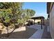 Spacious backyard with gravel and a gazebo at 5450 W Taro Ln, Glendale, AZ 85308