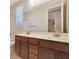 Bathroom boasts a double vanity and neutral tones at 5450 W Taro Ln, Glendale, AZ 85308