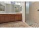 Elegant bathroom, featuring double vanity and shower at 5450 W Taro Ln, Glendale, AZ 85308