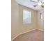 Bright bedroom with window and neutral wall colors at 5450 W Taro Ln, Glendale, AZ 85308