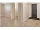 Bright and spacious entryway with tile flooring and access to other rooms at 5450 W Taro Ln, Glendale, AZ 85308