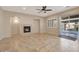 Bright Gathering room featuring a fireplace and access to a patio at 5450 W Taro Ln, Glendale, AZ 85308