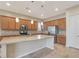 Large kitchen island with granite countertop and modern cabinetry at 5450 W Taro Ln, Glendale, AZ 85308