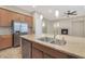 Modern kitchen with stainless steel appliances and granite countertops at 5450 W Taro Ln, Glendale, AZ 85308