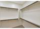 Spacious walk-in closet with custom shelving at 5450 W Taro Ln, Glendale, AZ 85308