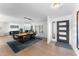 Modern dining area with wood table and light hardwood floors at 5717 E Justine Rd, Scottsdale, AZ 85254