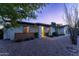 Contemporary home exterior with desert landscaping and walkway at 5717 E Justine Rd, Scottsdale, AZ 85254