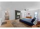 Bright main bedroom with ensuite bathroom and modern fireplace at 5717 E Justine Rd, Scottsdale, AZ 85254