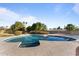 Inviting kidney-shaped pool with a spa and ample surrounding deck at 5717 E Justine Rd, Scottsdale, AZ 85254