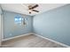 Bedroom with ceiling fan and view from window at 5927 W Mulberry Dr, Phoenix, AZ 85033