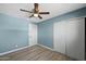 Spacious bedroom with mirrored closet doors at 5927 W Mulberry Dr, Phoenix, AZ 85033