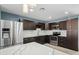 Modern kitchen with stainless steel appliances and island at 5927 W Mulberry Dr, Phoenix, AZ 85033