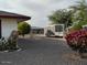 Landscaped front yard with decorative stone and plants at 5929 E Duncan St, Mesa, AZ 85205