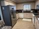 Galley kitchen with stainless steel appliances and granite counters at 5929 E Duncan St, Mesa, AZ 85205