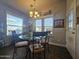 Bright dining area with a glass-top table and chairs at 650 N Hawes Rd # 3431, Mesa, AZ 85207