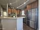 Modern kitchen with stainless steel appliances and ample cabinetry at 650 N Hawes Rd # 3431, Mesa, AZ 85207