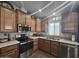 Modern kitchen featuring stainless steel appliances and ample cabinetry at 650 N Hawes Rd # 3431, Mesa, AZ 85207