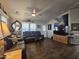 Open concept living room with hardwood floors and lots of natural light at 650 N Hawes Rd # 3431, Mesa, AZ 85207