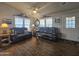 Relaxing living room featuring leather furniture and wood floors at 650 N Hawes Rd # 3431, Mesa, AZ 85207