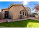 Nice backyard with grassy area, patio and brick pathway at 660 N Maple St, Chandler, AZ 85226