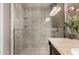 Modern bathroom with a large shower and granite countertop at 660 N Maple St, Chandler, AZ 85226