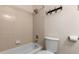 Simple bathroom with shower/tub, toilet and tile flooring at 660 N Maple St, Chandler, AZ 85226