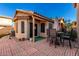 Private patio with brick pavers and seating area at 660 N Maple St, Chandler, AZ 85226