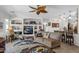 Bright living room featuring comfortable seating and built-in shelving at 6825 S Whetstone Pl, Chandler, AZ 85249