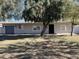 Cute ranch home with a landscaped lawn and attached garage at 7015 N 23Rd Ln, Phoenix, AZ 85021