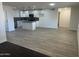 Modern kitchen with island and open concept floorplan at 7015 N 23Rd Ln, Phoenix, AZ 85021