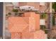 Aerial view of house showcasing its tile roof and surrounding landscape at 7019 W Mcmahon Way, Peoria, AZ 85345