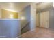 Upper level hallway with access to bedrooms and bathroom at 7019 W Mcmahon Way, Peoria, AZ 85345