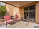 Peaceful covered patio perfect for outdoor relaxation at 7019 W Mcmahon Way, Peoria, AZ 85345