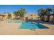 Community pool with a large sundeck at 7019 W Mcmahon Way, Peoria, AZ 85345