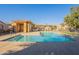 Community pool with a relaxing atmosphere at 7019 W Mcmahon Way, Peoria, AZ 85345