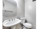 Powder room with pedestal sink and octagonal mirror at 7132 W Villa Chula --, Glendale, AZ 85310