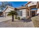 Two-story home with attached garage and desert landscaping at 7132 W Villa Chula --, Glendale, AZ 85310