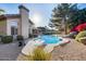 Inviting pool with diving board, surrounded by landscaping at 7132 W Villa Chula --, Glendale, AZ 85310