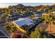 Aerial view of house with pool, landscaping and mountain views in the background at 7501 N 22Nd Pl, Phoenix, AZ 85020