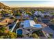 Aerial view of house, pool, and surrounding neighborhood at 7501 N 22Nd Pl, Phoenix, AZ 85020