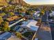 Aerial view of house, pool, and surrounding neighborhood at 7501 N 22Nd Pl, Phoenix, AZ 85020