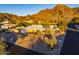 Aerial view of single-story home with desert landscaping and mountain views at 7501 N 22Nd Pl, Phoenix, AZ 85020