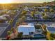 Aerial view of single-story home with pool and surrounding neighborhood at 7501 N 22Nd Pl, Phoenix, AZ 85020