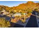 Aerial view of single story home with desert landscaping, pool, and mountain views at 7501 N 22Nd Pl, Phoenix, AZ 85020