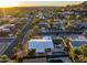 Aerial view of single-story home with pool and surrounding neighborhood at 7501 N 22Nd Pl, Phoenix, AZ 85020