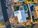 Aerial view of house, highlighting the white roof, pool, and backyard at 7501 N 22Nd Pl, Phoenix, AZ 85020