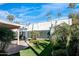 Relaxing backyard patio area with a heater and lush landscaping at 7501 N 22Nd Pl, Phoenix, AZ 85020