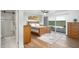 Bedroom with wooden bed frame, dresser, and sliding glass doors opening to a pool view at 7501 N 22Nd Pl, Phoenix, AZ 85020