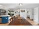 Farmhouse dining table with view into living and bedroom areas at 7501 N 22Nd Pl, Phoenix, AZ 85020